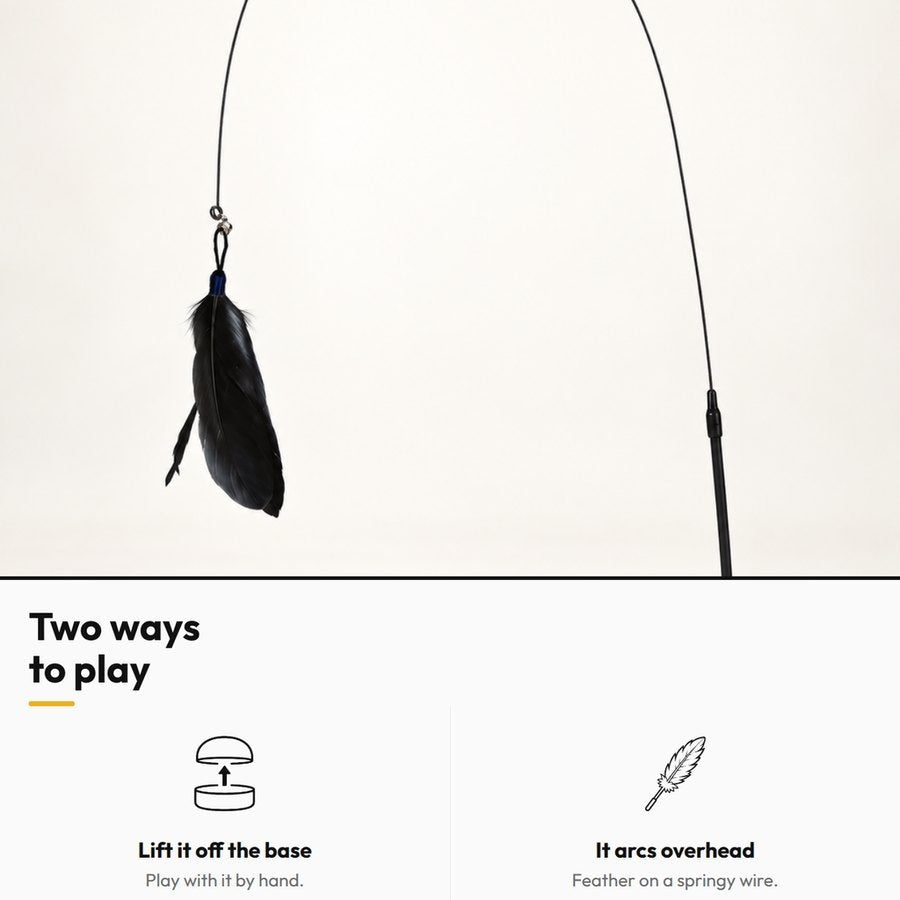 Solo Play Feather Wand — Two ways to play: Lift it off the base; It arcs overhead
