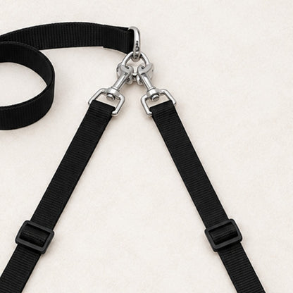 Close-up of the junction where the single handle divides into two leads