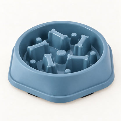 Muted blue slow feeder bowl with bone-shaped posts and round pegs rising from the base