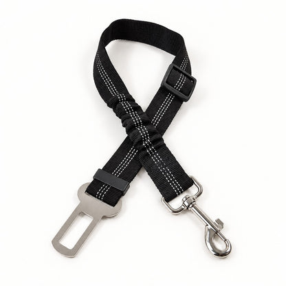 Black adjustable seat belt strap with reflective stitching, swivel clip and metal buckle tongue on white