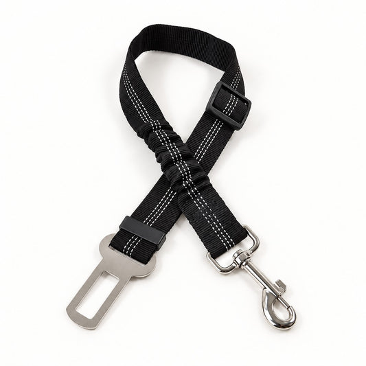 Black adjustable seat belt strap with reflective stitching, swivel clip and metal buckle tongue on white