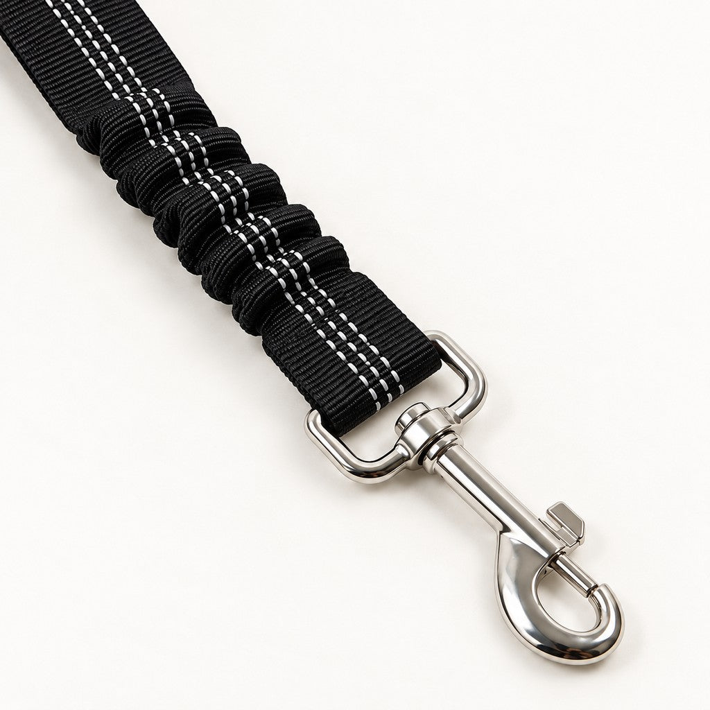 Close view of the swivel clip and ruched elastic section of the black reflective-stitched strap