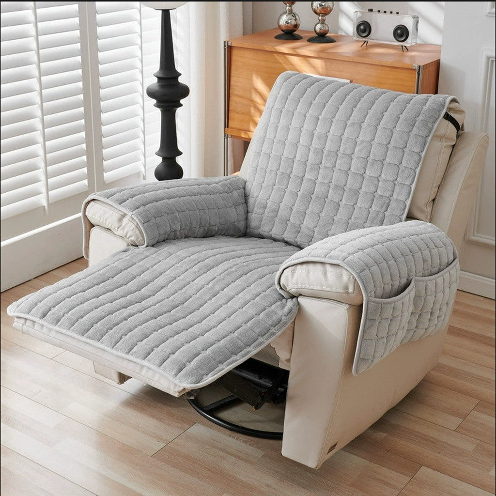 Light grey quilted plush cover on a cream recliner chair with arm pocket, bright room