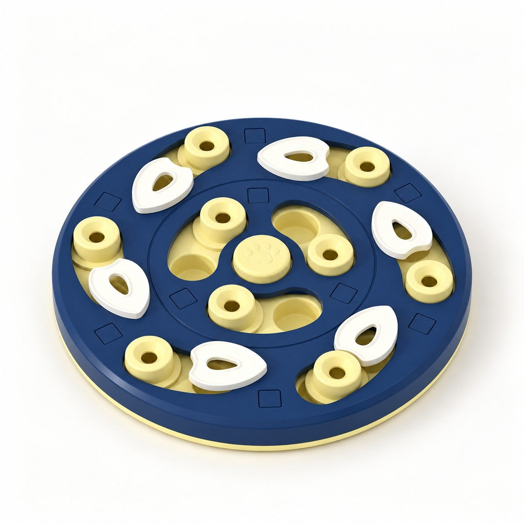 Round navy and yellow food puzzle plate with white lids, yellow posts and paw-print centre
