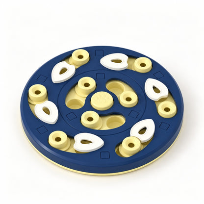 Round navy and yellow food puzzle plate with white lids, yellow posts and paw-print centre