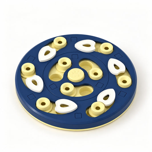 Round navy and yellow food puzzle plate with white lids, yellow posts and paw-print centre