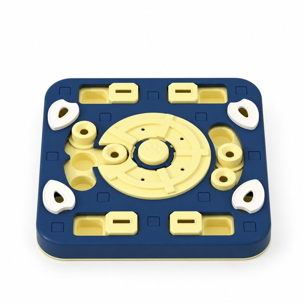 Square navy and yellow food puzzle plate with white lids and a round paw-print centre disc