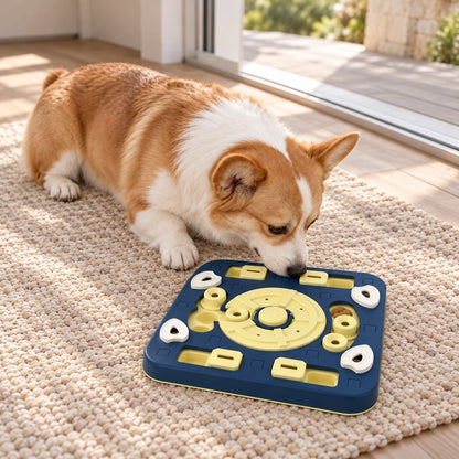 Corgi lying on a woven rug with its nose on the navy square puzzle plate