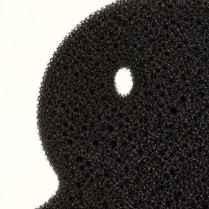 Close-up of the open-pore black foam texture