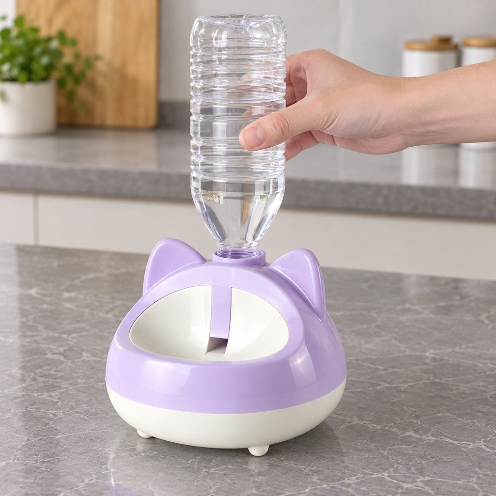 Hand placing a bottle upside down into the top of the dispenser