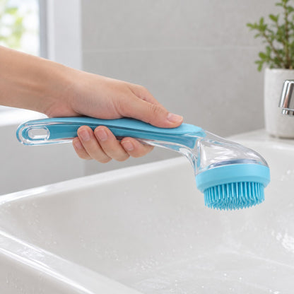 Hand gripping the long clear handle of the bath brush naturally