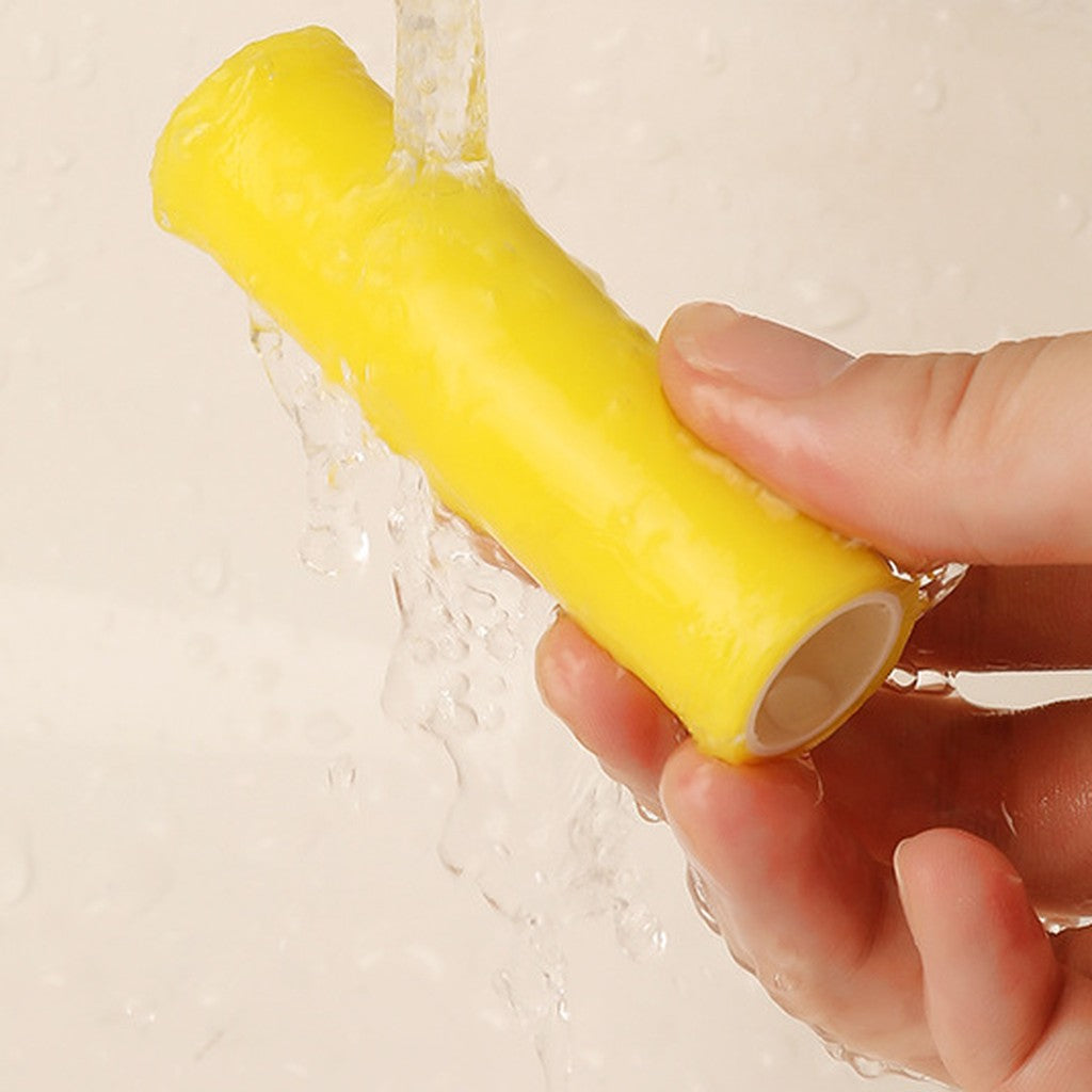 Roll being rinsed under running tap water