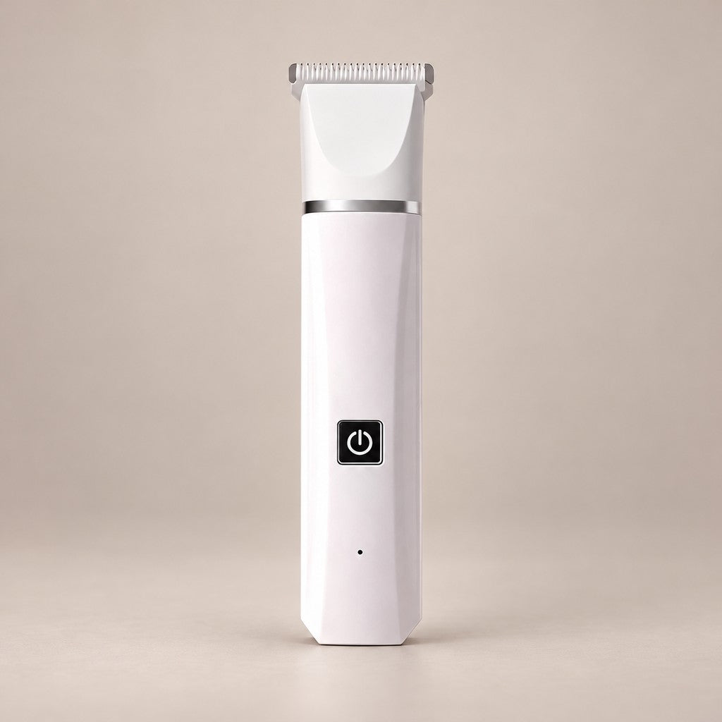 Slim white pet hair trimmer with wide comb head, silver band and black button