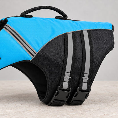 Close view of the black side straps, buckles and back handle on the blue vest