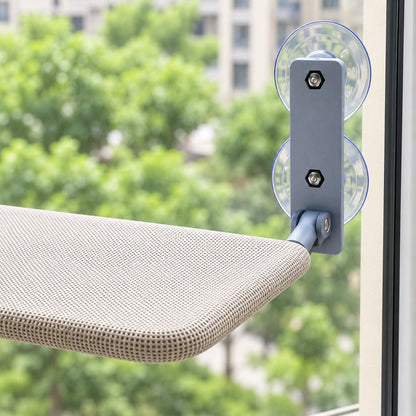 Close view of a grey bracket with two suction cups meeting the shelf's textured edge