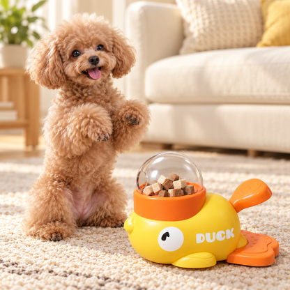 Little Duck Treat Spinner — apricot toy poodle sitting up beside the yellow duck treat toy, tongue out