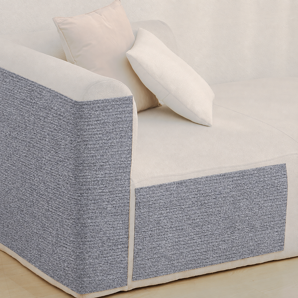 Stick-On Sofa Scratch Panel — Light Grey panels on a cream sofa