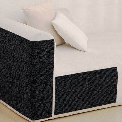 Stick-On Sofa Scratch Panel — Black panels on a cream sofa