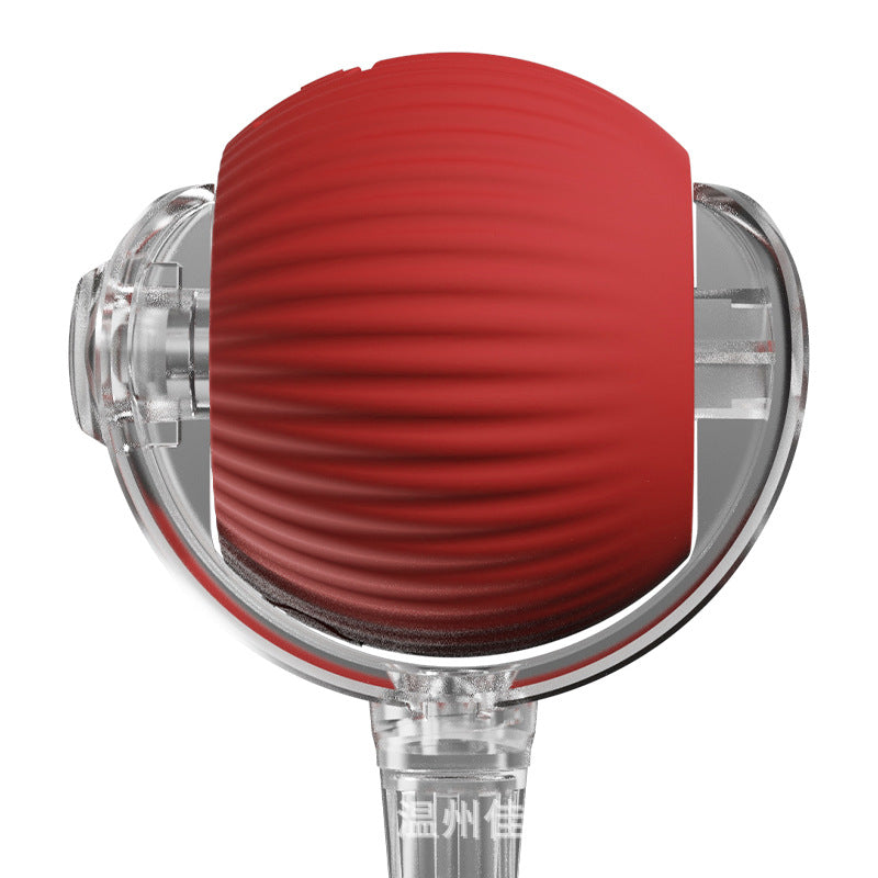 Close-up of the red silicone ball seated in the clear rolling shell