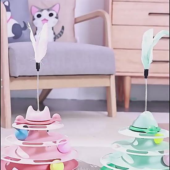 Cats play with ball tower