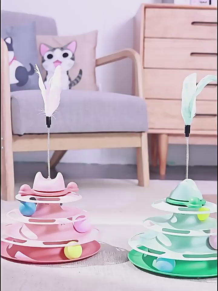 Cats play with ball tower